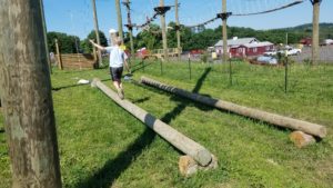 Log cross at farm obstacle course