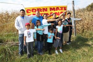 Family entering the Hellerick's Family Farm Corn Maze in Bucks County, PA.