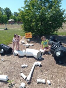 Kids playing with adventure farm outdoor activities