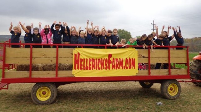 Children on a hayride during a field trip in pa